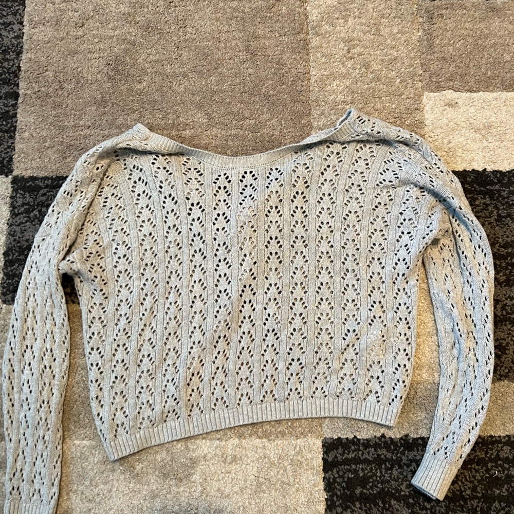 Cropped long sleeve sweater